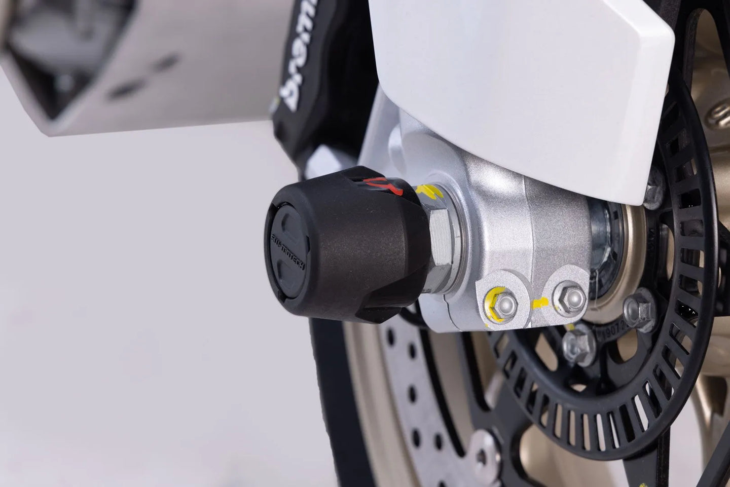 FRONT AXLE SLIDER SET ΓΙΑ MOTO GUZZI V100 1050 MANDELLO ABS / V85 850 TT '22–'24 | SW-MOTECH-STP.17.176.10100/B