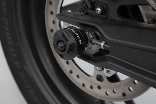 REAR AXLE SLIDER ΓΙΑ TRIUMPH TIGER '11–'23 | SW-MOTECH-STP.11.176.10100/B